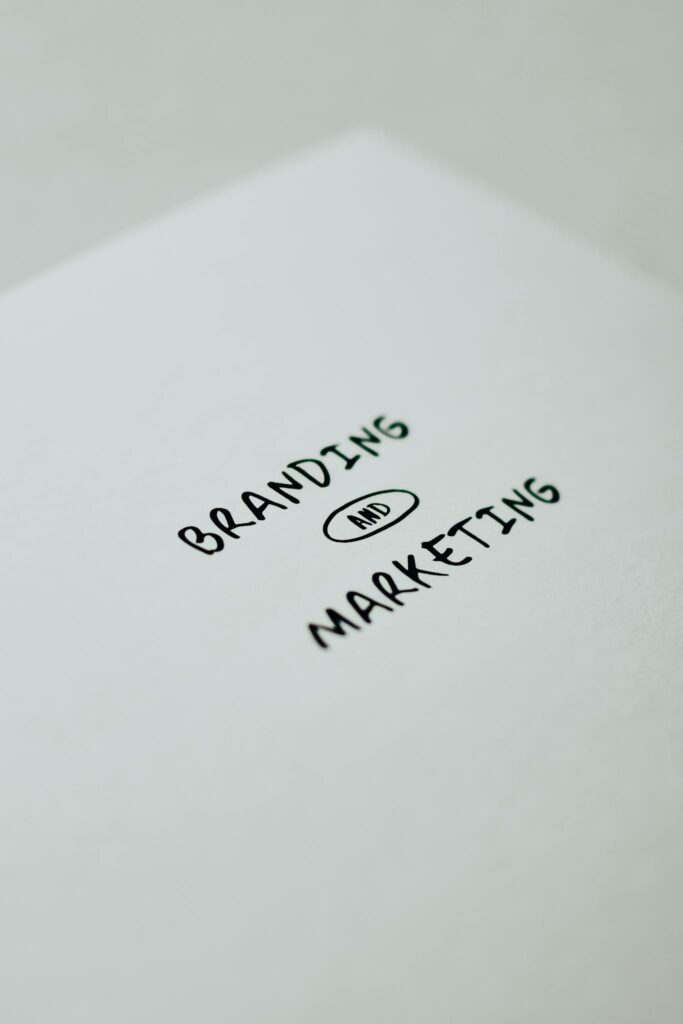 Minimalistic design showcasing 'branding and marketing' text for business strategy visuals.
