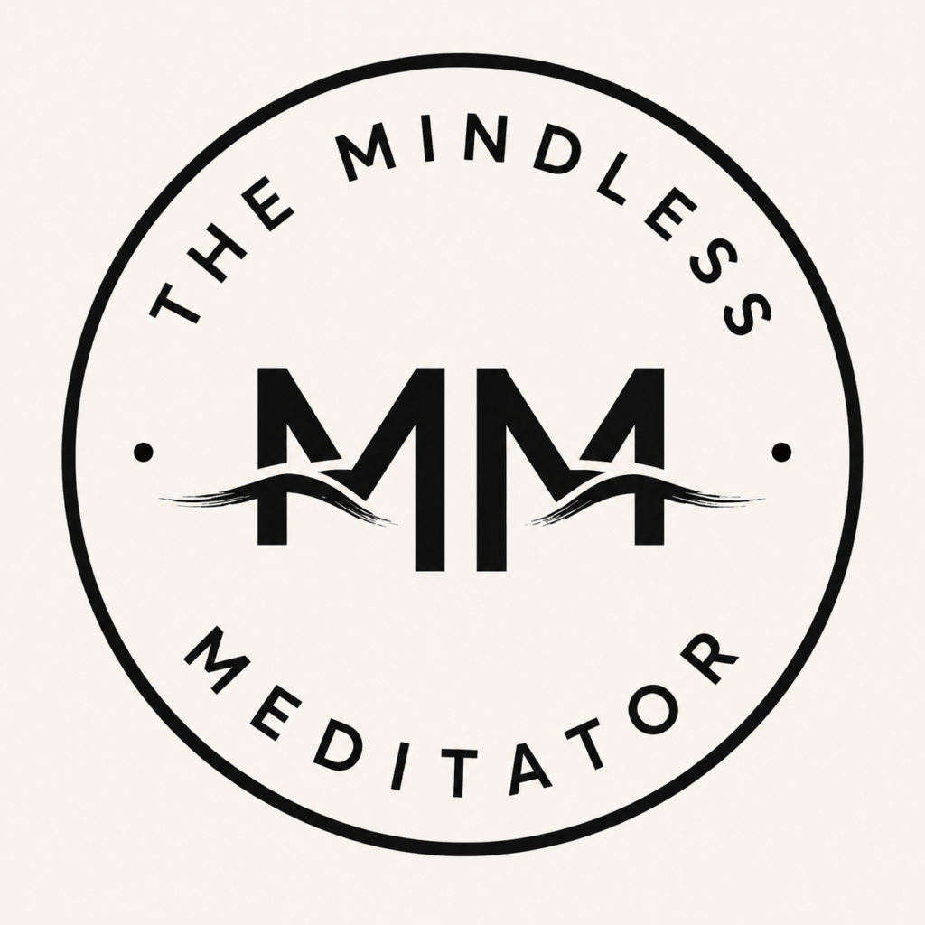 Circular logo badge with 'THE MINDLESS' on the top arc and 'MEDITATOR' on the bottom arc, featuring bold 'MM' in the center with decorative waves and two small dots.